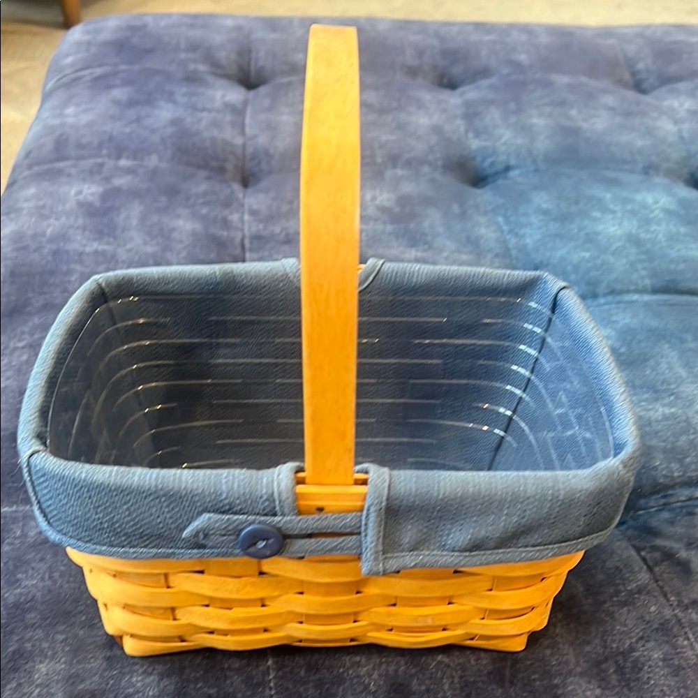 Longaberger Woven Basket with Blue Lining, wood handle, and plastic protector